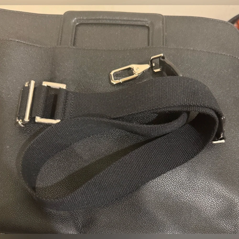 charles y keith Black Laptop Bag with Minimalist Design and Adjustable Strap
